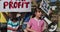 Group of kids with climate change signs and megaphone in a protest