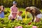 Group of kids at the excursion at the flower garden