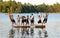 Group of kids jump into Lake