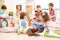 Group of kids with musical instruments in daycare