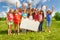 Group of kids with placecard