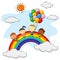 Group of kids playing above the rainbow with colorful balloons