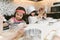 Group of kids are preparing the bakery in the kitchen .Children learning to cooking cookies.