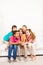 Group of kids singing on sofa