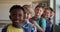 Group of kids standing in a queue in school