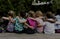 Group of kindergarten kids friends arm around sitting together