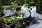 Group of kindergarten kids learning gardening outdoors