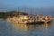 Group of Large Tourist Junk Boats without sail docking in Halong Bay