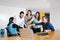 Group of latin business people working together as a teamwork while sitting at the office desk in a creative office in Mexico city