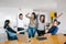 Group of latin business people working together as a teamwork while sitting at the office desk in a creative office in Mexico city