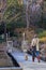 Group of locals walking in the park of Nara. People of Japan.