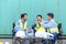 Group of logistic staff workers talk and rest sitting in the shipping yard container during break time. Cargo ship import export