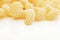 Group of macaroni pasta on white background