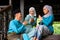 A group of malay muslim people in traditional costume showing greeting gesture during Aidilfitri celebration at terrace of