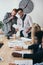 group of managers having conversation in conference hall