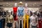 Group mannequins in variety clothing style showcase at the store.