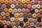 group of many donuts seamless background, close of view