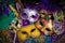 Group of Mardi Gras Mask on dark background with beads