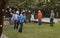 Group Of Mature Friends Playing Croquet In Backyard Together