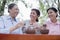 Group of mature women drinking Chinese tea in the park