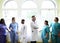 Group of medical professionals discussing in the hallway of a hospital