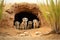 group of meerkats on alert at their burrow entrance