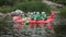 Group of men and women, enjoy water rafting activity at river. Rafting on the Pivdennyi Buh