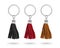 A group of metallic souvenir. Tassel key ring isolated on white background. Fashion leather key chain for decoration