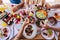 Group of mixed ages generations eating and celebrating together in friendship - family people caucasian concept in close up view