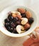 Group of mixed nuts and berries. Cashews, almonds, hazelnuts, black currants.