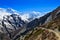 Group of mountain trekkers backpacking in Himalayas landscape