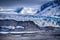 Group of mountaineers on snowy mountain in Iceland