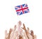 Group of multi-ethnic people reaching for and holding the flag o