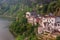 Group of multi-level houses along green river, Yichang, China