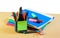 Group of multicolored office folders, glasses and office supplie