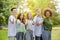 Group Of Multiethnic Teen Friends Standing Outdoors Showing Thumbs Up At Camera