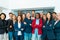 Group of multigenerational business team standing in front of camera during meeting work