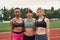 Group of multiracial sports women hug on treadmill