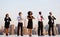 A Group Of Office Workers Doing Outdoor Yoga