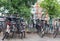 Group of old vintage bicycles parked on the street in Amsterdam