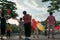 Group of old women dancing with fan for excercise in early morning in Hanoi, Vietnam