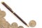 Group of one dollar coins with wooden texture pen