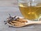 Group of Ophiocordyceps sinensis or mushroom cordyceps this is a herbs placed on wooden spoon in front of a glass of cordyceps