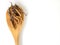 Group of Ophiocordyceps sinensis or mushroom cordyceps this is a herbs placed on wooden spoon on white isolated background. on woo