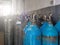 Group of oxygen cylinder tank with compressed gas for industrial use in the factory.