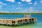 Group of oxygen tanks stands on jetty in sea