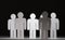 Group of papermen on black background