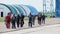 Group of Parachutists Goes to the Plane near the Hangar for a Parachute Jump