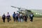 Group of parachutists skydivers go to the airplane for training parachute jumps