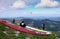 Group of paragliding students during an instruction course and flying lesson in the Alps